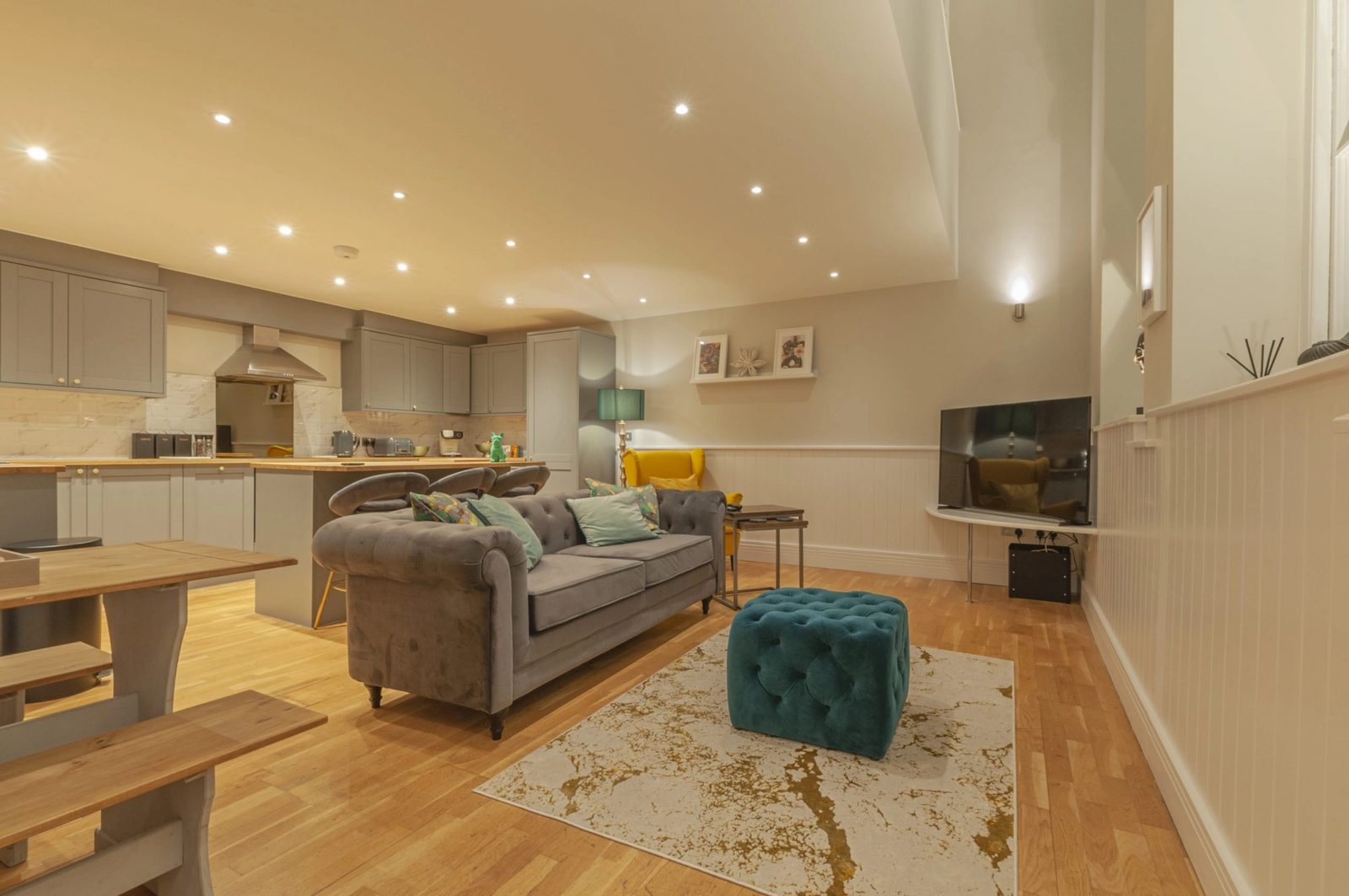 The open plan living space, looking back towards the kitchen